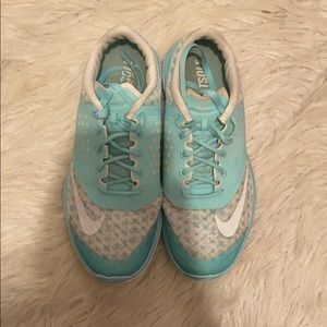Teal Nike shoes